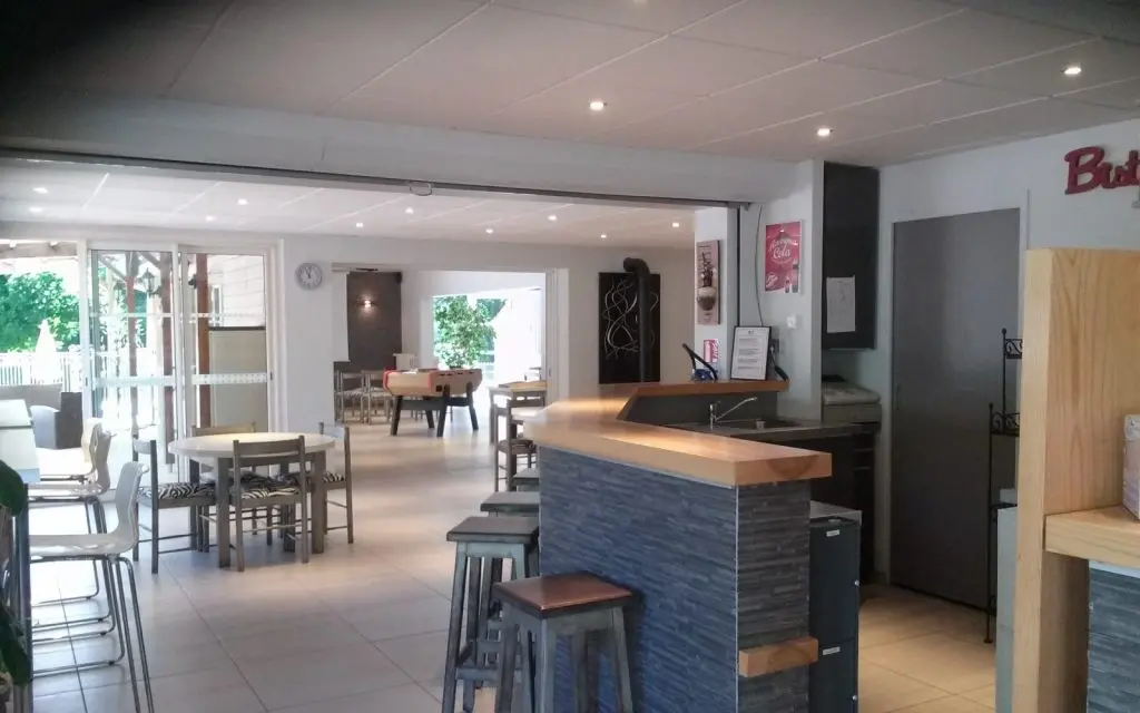 Modern café interior with bar and seating area