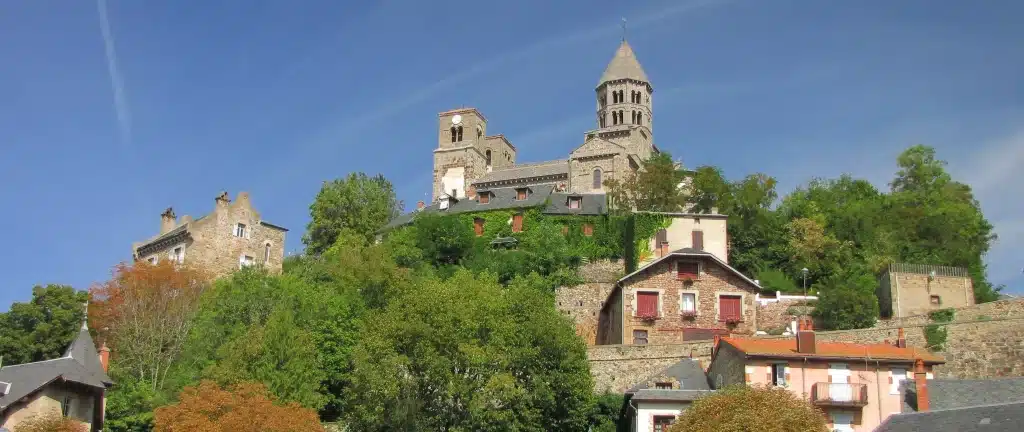 Hilltop stone village with church and tower