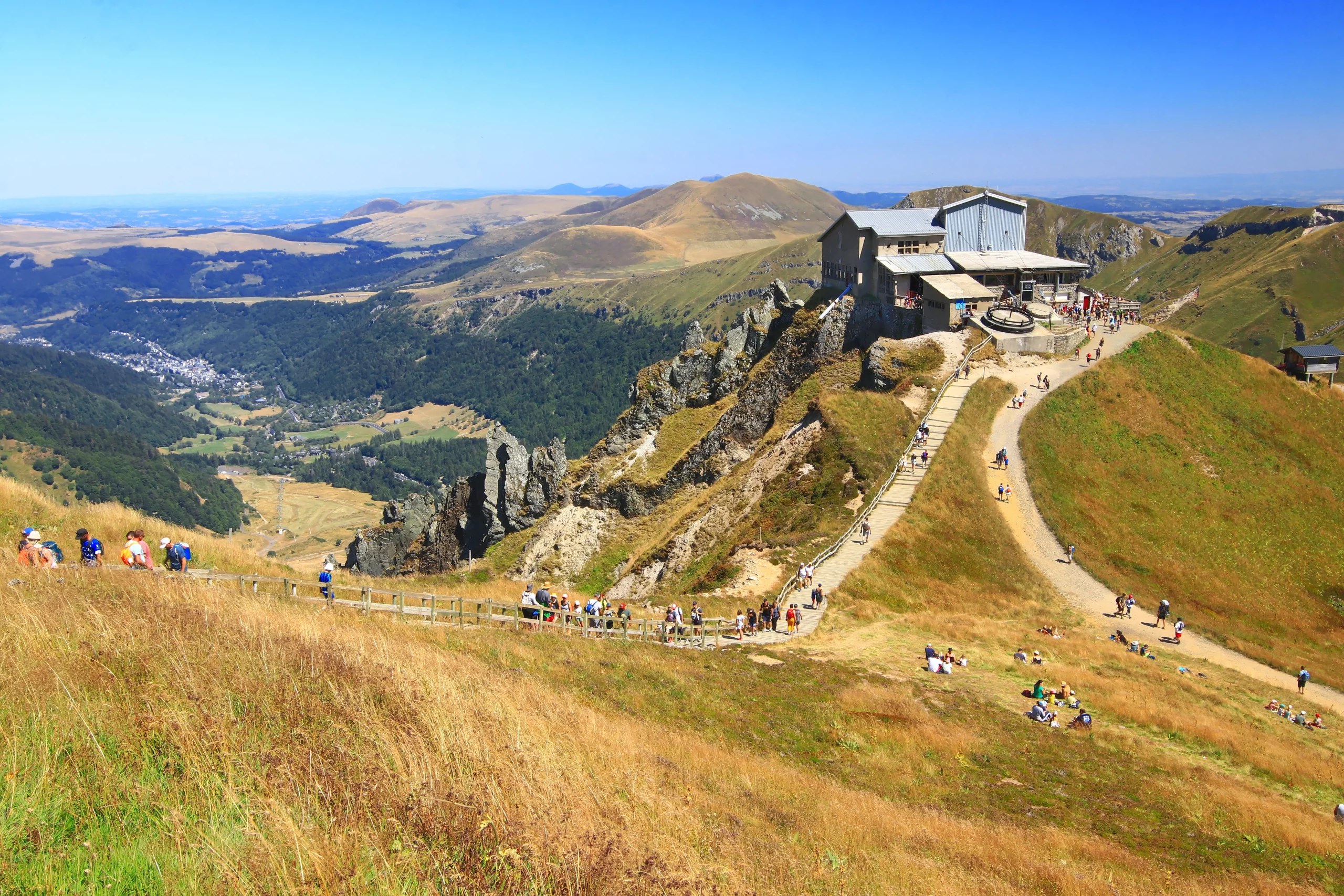 Mountain lodge overlooking scenic valley and hiking trail